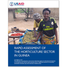 USAID report cover with Guinean woman farmer showing vegetables in solar dryer