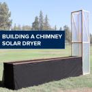 "Building a chimney solar dryer" text on image of a chimney solar dryer in a field